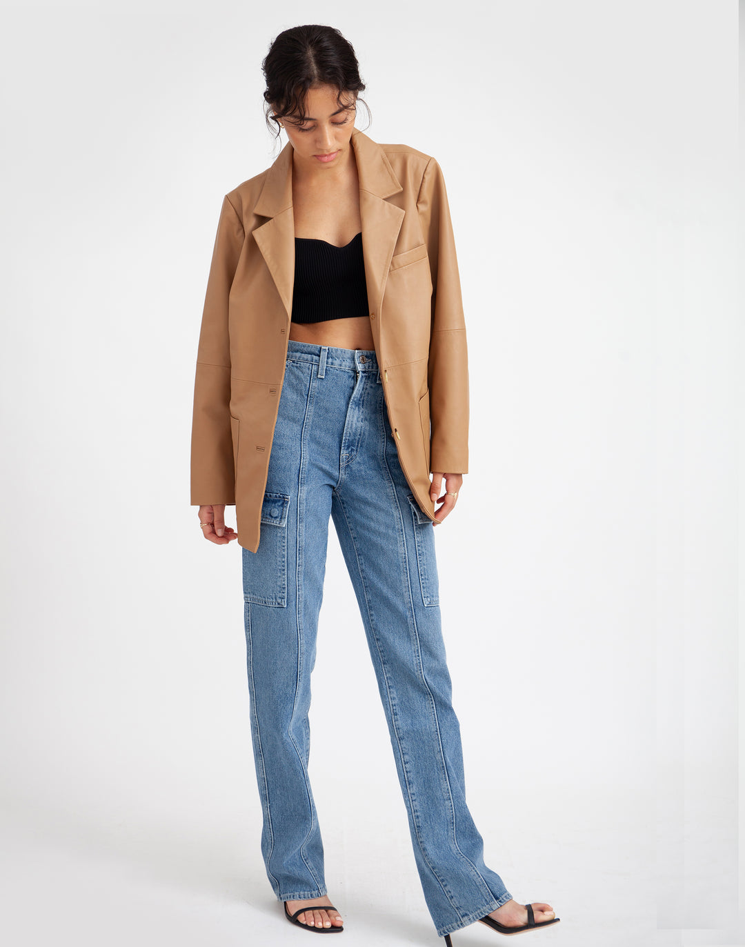 Sustainable leather blazer with relaxed fit in black #color_camel