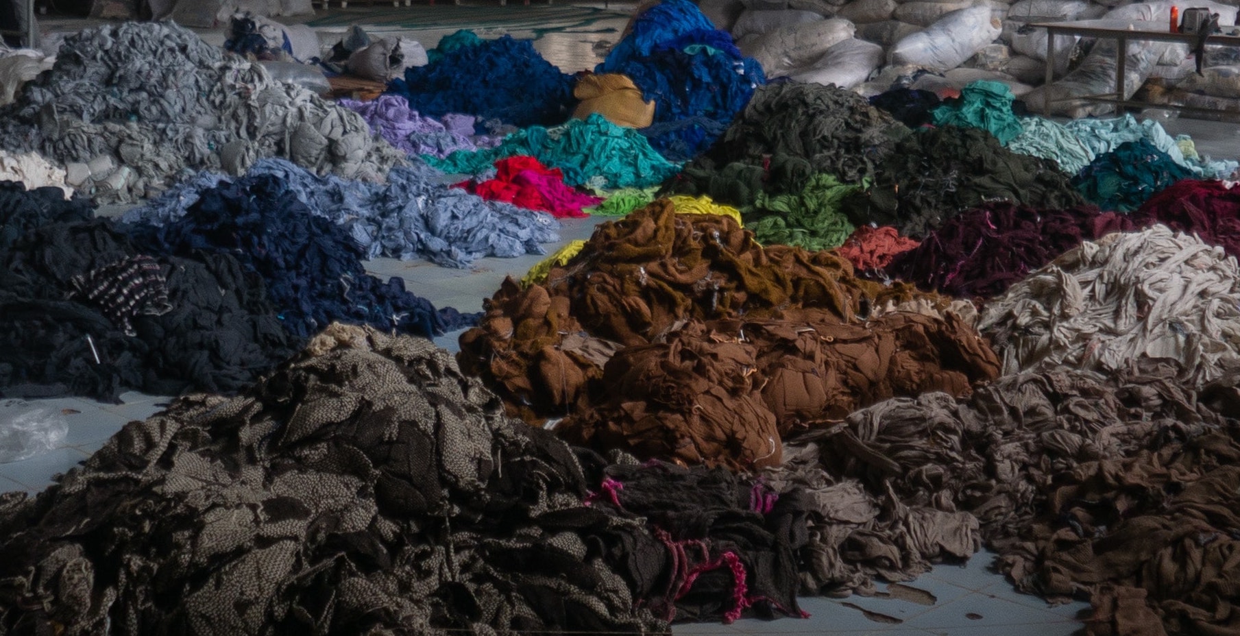 Hundreds of tons of fabric found at an abandoned factory in Cambodia. Photo by&nbsp;<a href="https://unsplash.com/@flenguyen" class="_3XzpS _1ByhS _4kjHg _1O9Y0 _3l__V _1CBrG xLon9">Francois Le Nguyen</a>