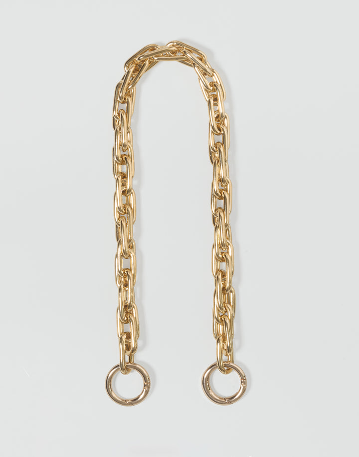 HYER GOODS gold-toned metal chain link accessory with two circular ring ends #color_gold