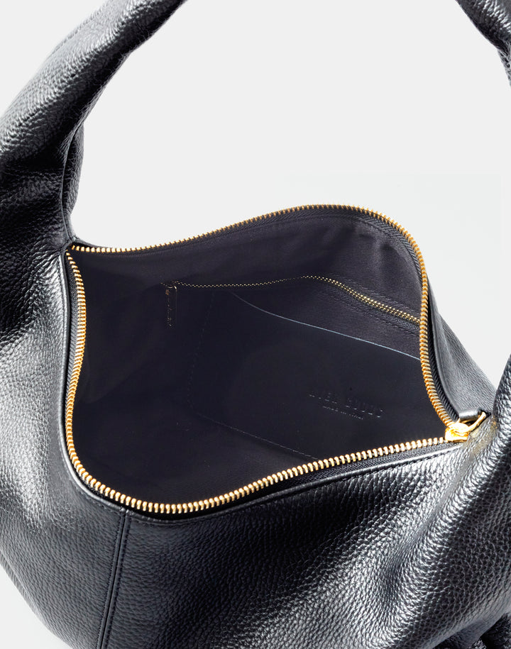 HYER GOODS slouchy everyday shoulder bag #color_black-gold