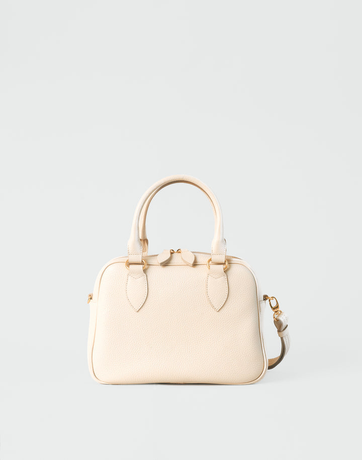 hyer goods la corsa off-white leather bowling bag with crossbody strap front bone with gold hardware #color_bone