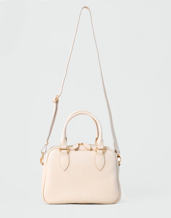 hyer goods la corsa off-white leather bowling bag with crossbody strap bone with gold hardware front #color_bone