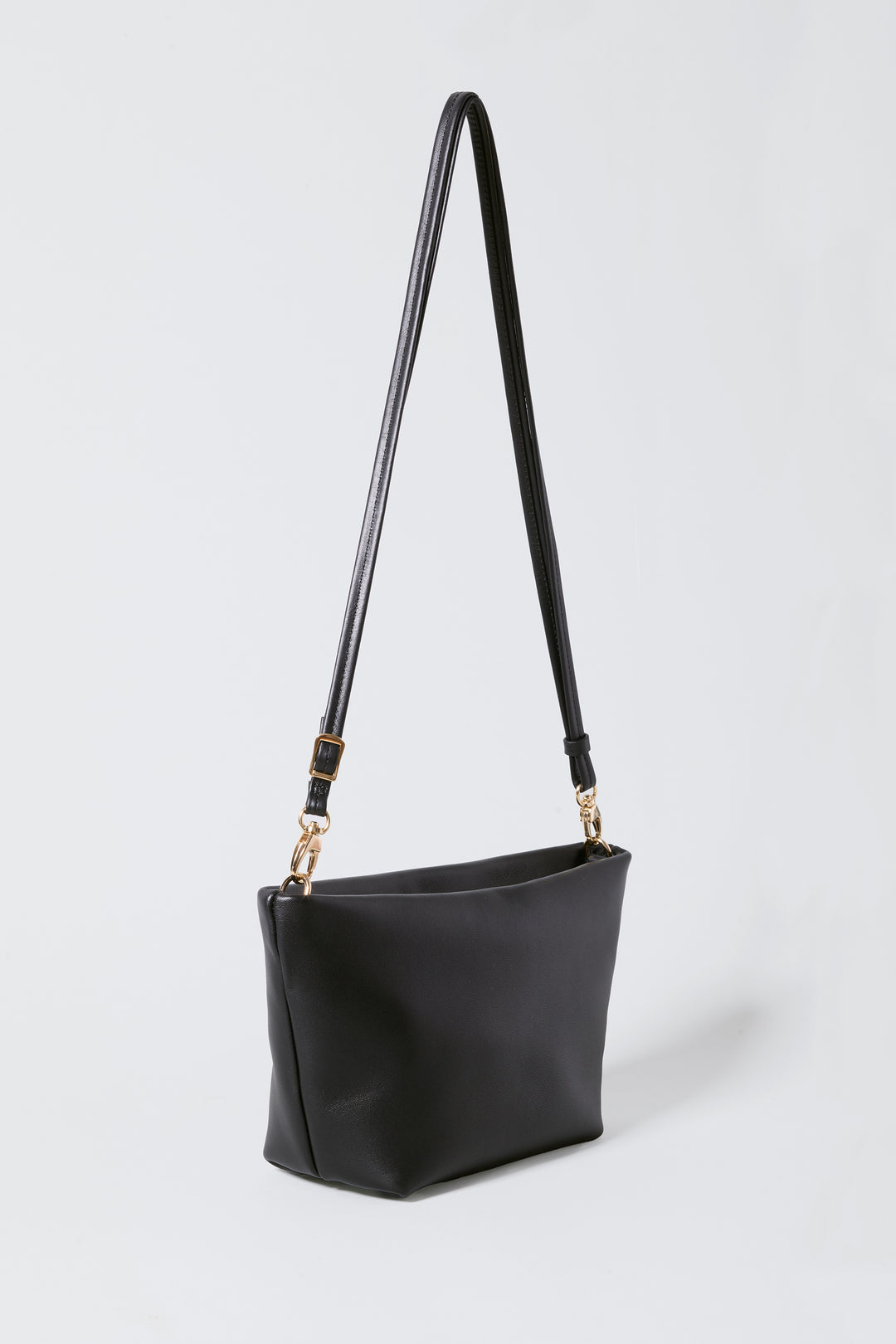 hyer goods la sala minimal convertible shoulder bag 3/4 view with long thin strap up in black nappa with gold hardware #color_black-gold