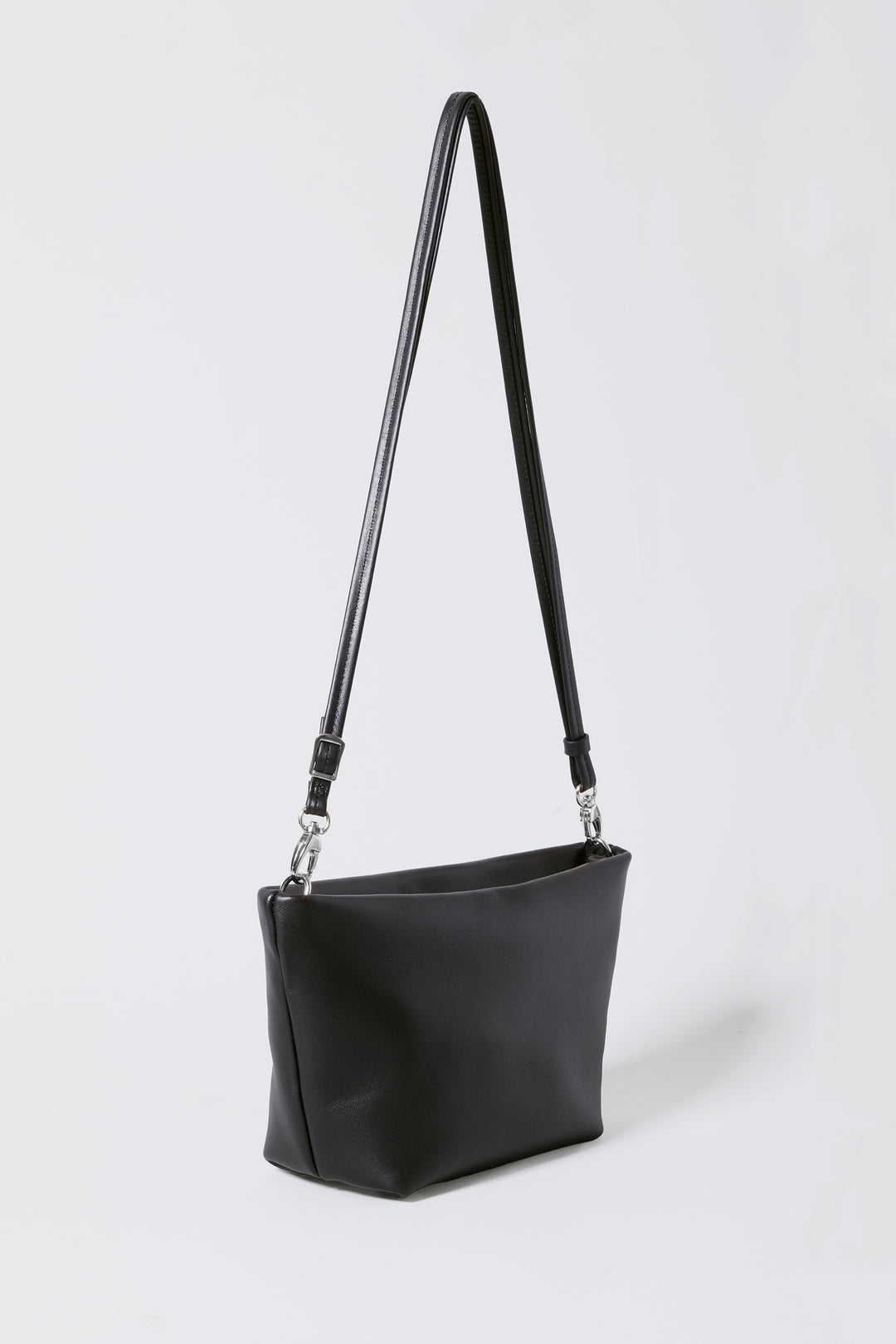 hyer goods la sala minimal convertible shoulder bag 3/4 view with long thin shoulder strap up in black nappa with silver hardware #color_black-silver
