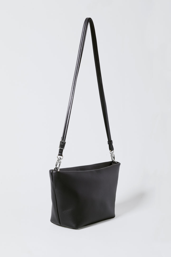 hyer goods la sala minimal convertible shoulder bag 3/4 view with long thin shoulder strap up in black nappa with silver hardware #color_black-silver