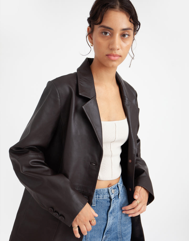 Sustainable leather blazer with relaxed fit in black #color_chocolate