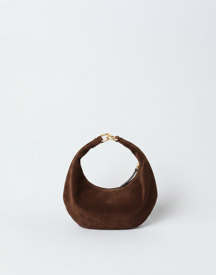 A dark brown suede HYER GOODS micro ring bag crescent-shaped mini shoulder bag with a gold-tone metal clasp, set against a plain light gray background. #color_chocolate-suede