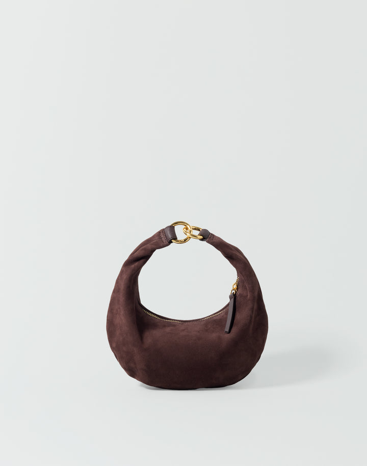 A dark brown suede crescent-shaped shoulder bag with a gold-tone chain-link handle and a small gold zipper pull, set against a plain light gray background. #color_chocolate-suede