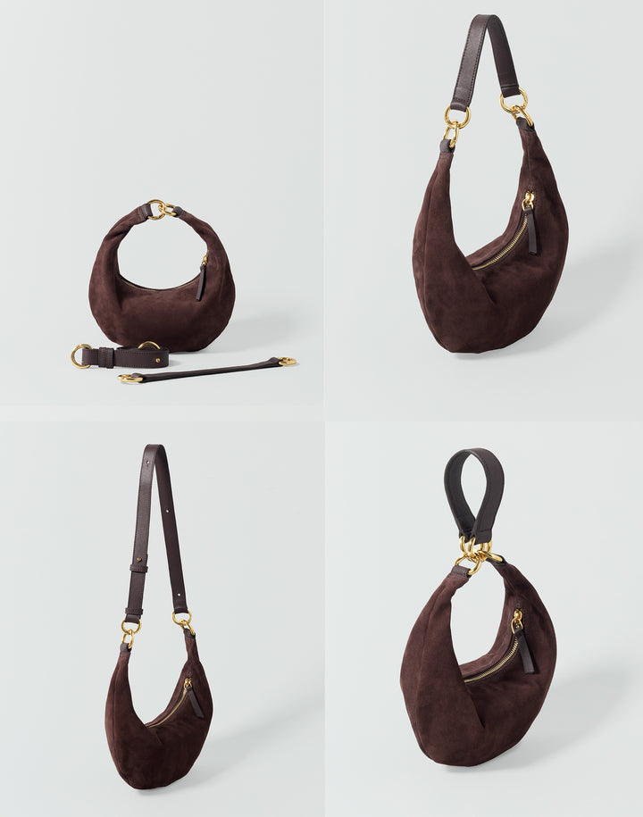 A dark brown suede crescent shoulder bag shown in four views on a light gray background, including a front view with strap, a side view with strap, a back view with strap, and a close-up of the bag with strap laid beside it. The bag has gold-tone hardware and a zip-around closure.#color_chocolate-suede