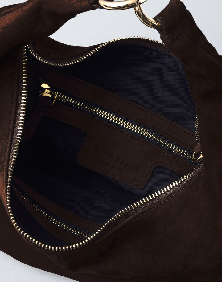 inside view of a chocolate brown suede bag with gold zipper #color_chocolate-suede