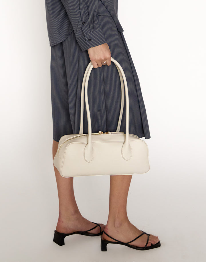 HYER GOODS La Strada East West Bag in off-white #color_off-white