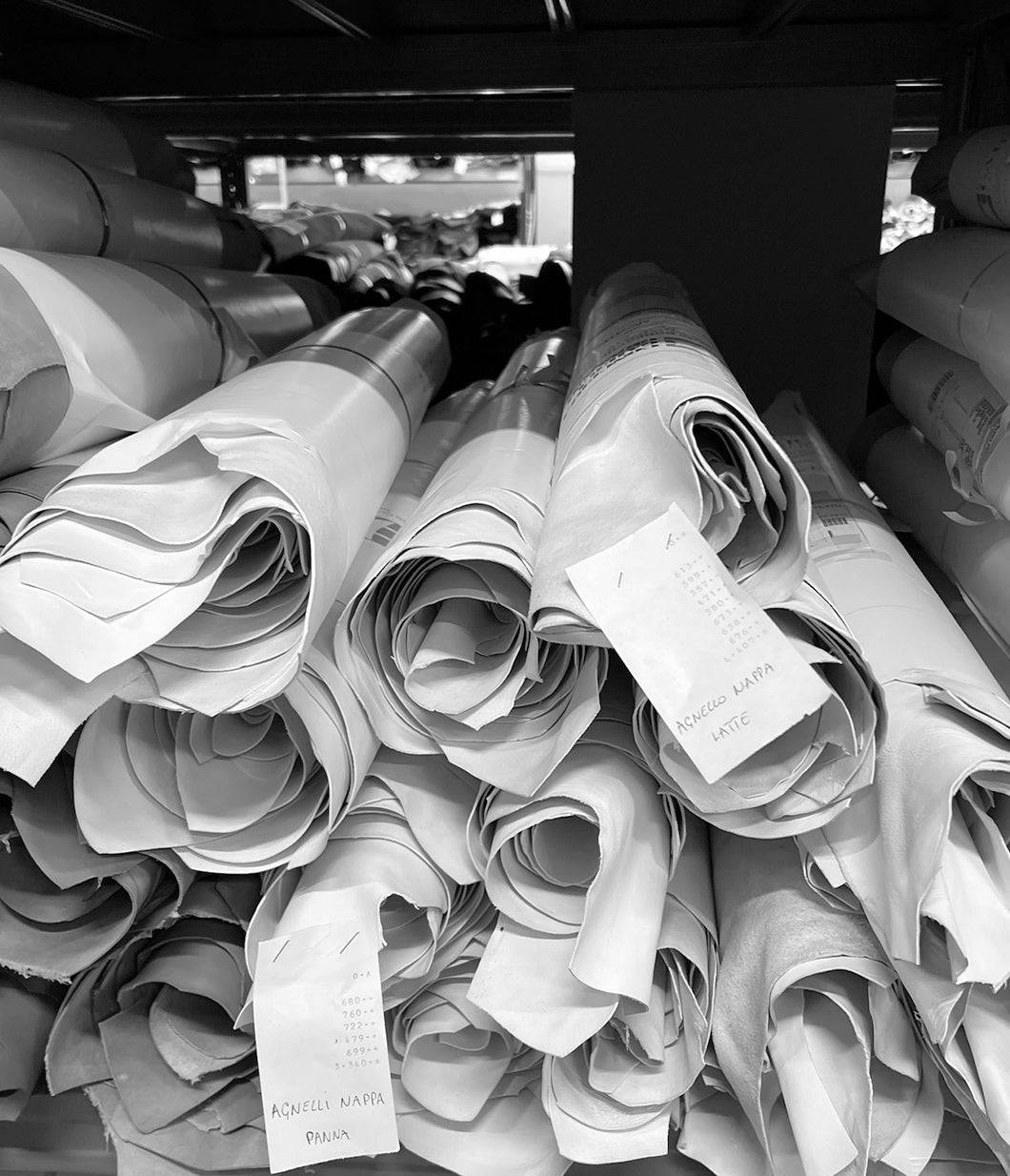 Luxury deadstock leather rolls used to create sustainable Italian handbags.