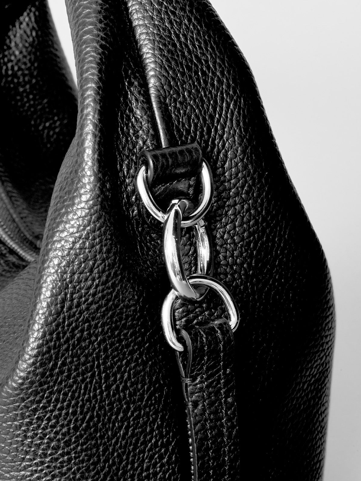 a close up of an italian pebbled leather handbag